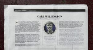 Newspaper interview of Carl with his answers to questions and photo of his head in the middle of the page